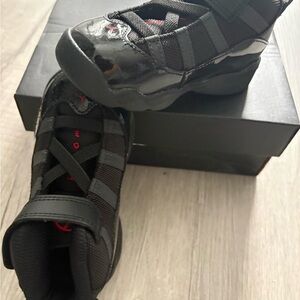 Jordan Kids Black Sneaker with Red Accents